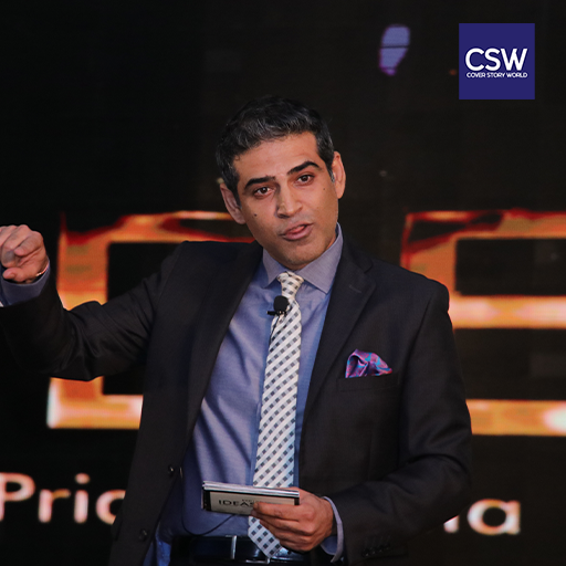 Keynote speaker delivering ideas address at The Cover Story World Magazine business event