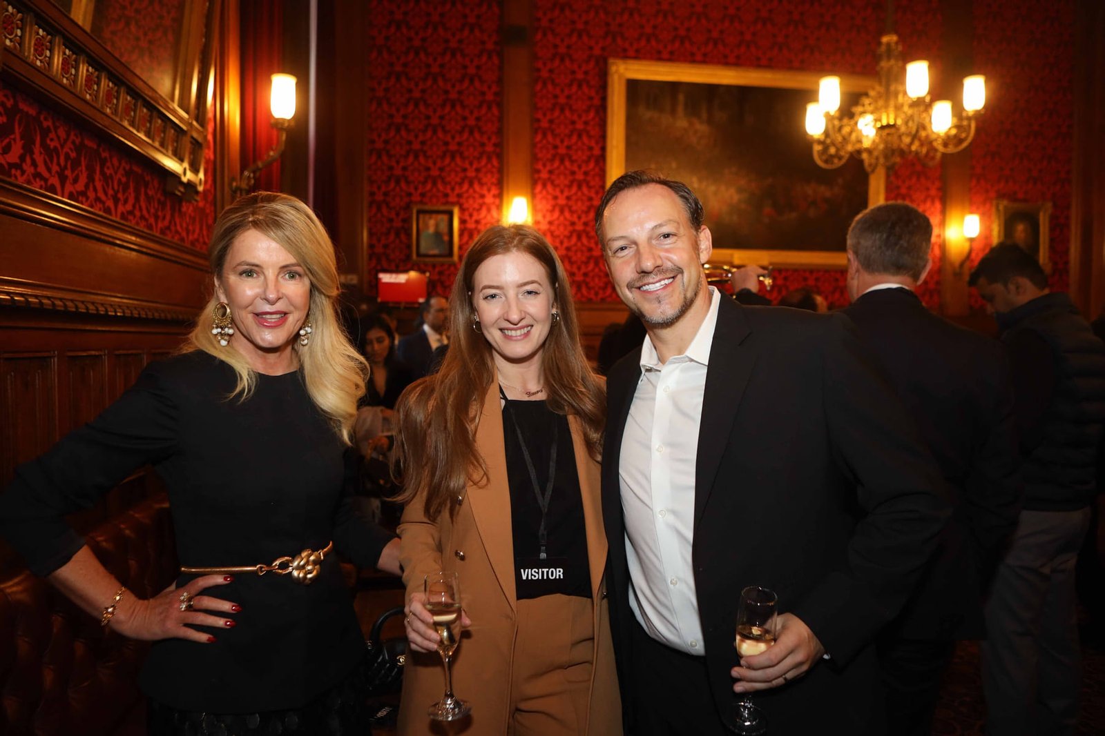 Three guests during the drinks reception at the House of Lords